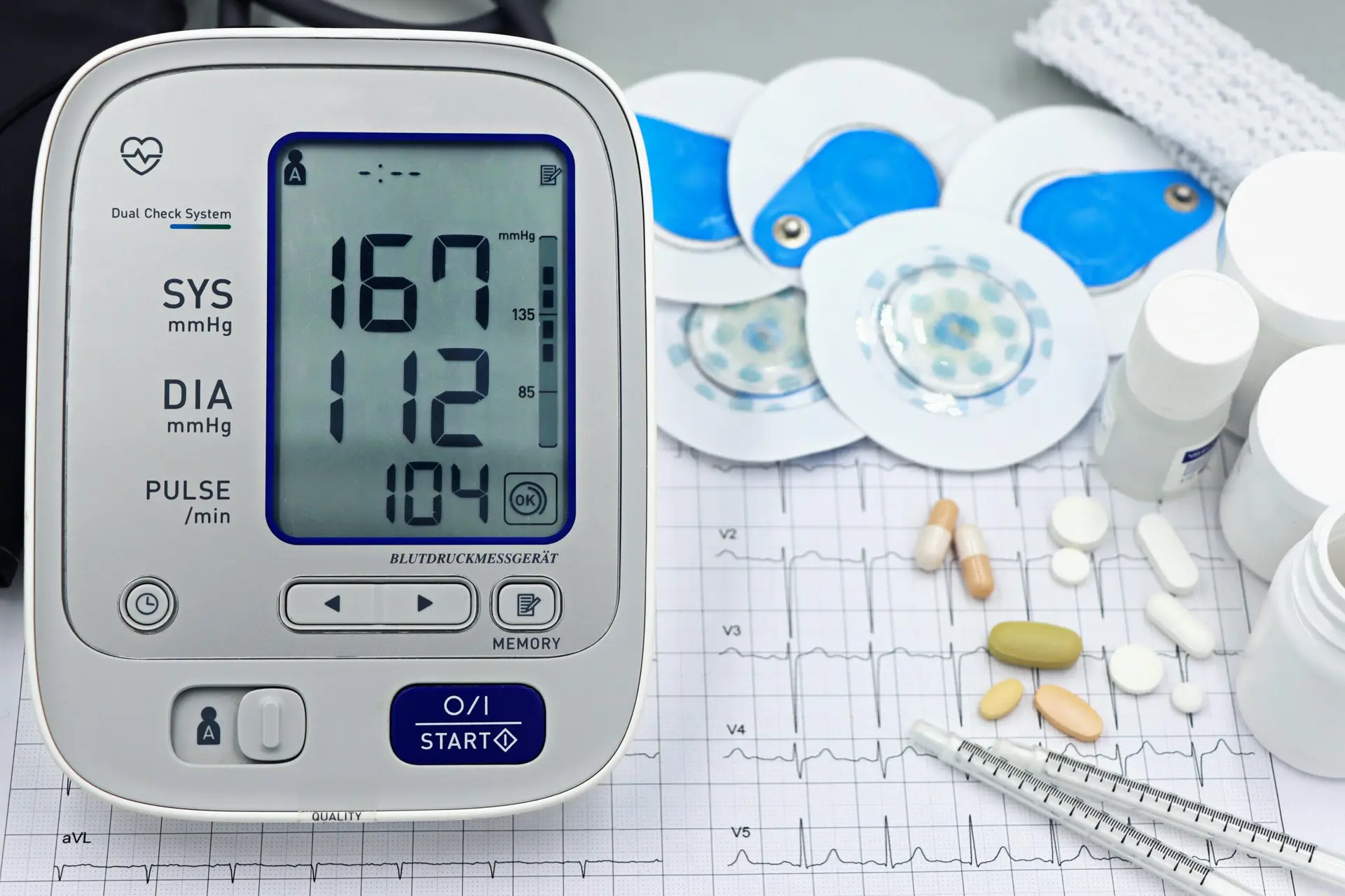 Blood pressure monitor showing high systolic and diastolic numbers